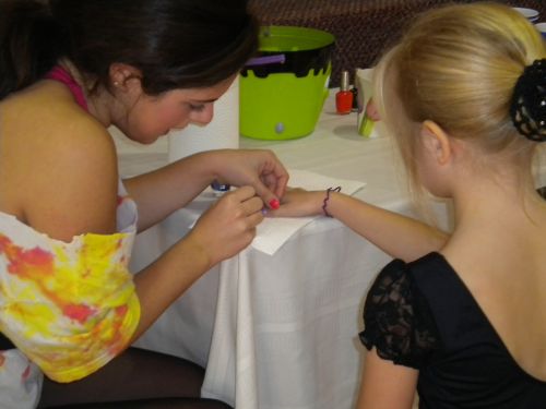 Painting nails at our Fun Fair